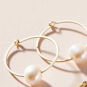 Freshwater pearl hoop earrings.